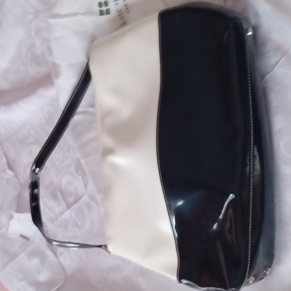 Kate Spade black and white patent leather handbag.